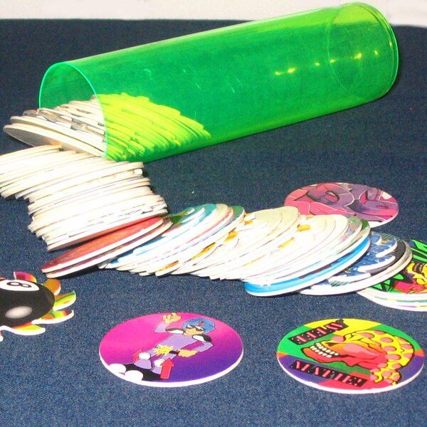 Pogs from The Most Awesome Things From the '90s | E! News